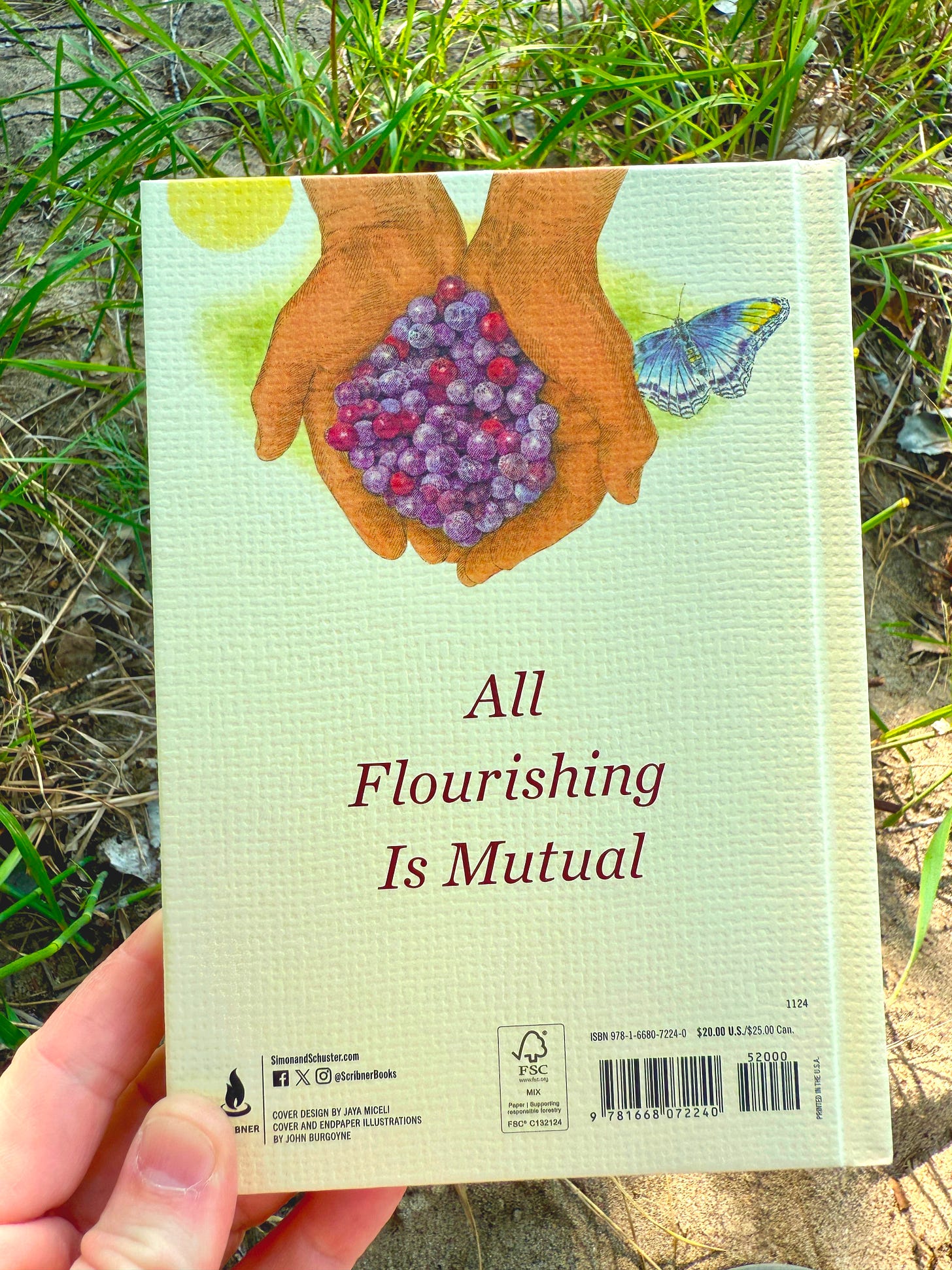 “All flourishing is mutual” on the back cover of The Serviceberry by Robin Wall Kimmerer