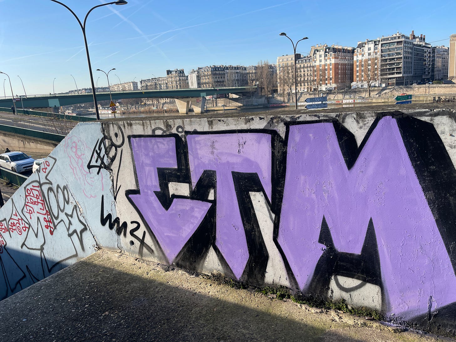 Paris graffitti and Pont Garigliano in the background Paris graffitti and Pont Garigliano in the background