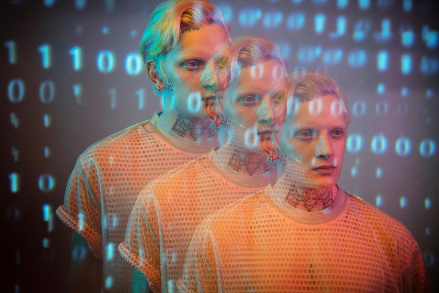 Three overlapping human faces with binary code overlay — visual metaphor for algorithmic doubles and divergent feed timelines.
