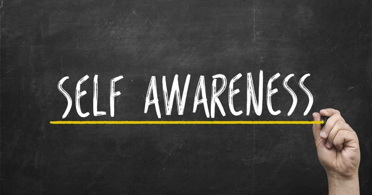 self awareness concept. Hand with yellow marker writing self awareness