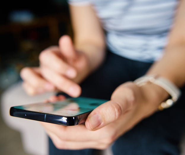 A person holding a cell phone
AI-generated content may be incorrect. A person holding a cell phone
AI-generated content may be incorrect.