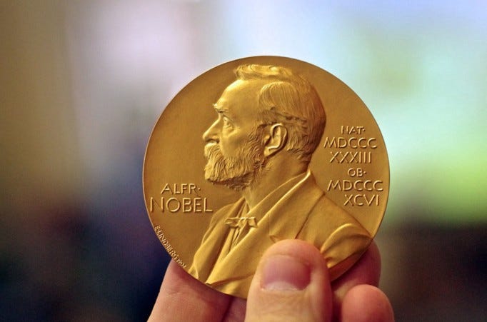 A golden Nobel Prize coin A golden Nobel Prize coin