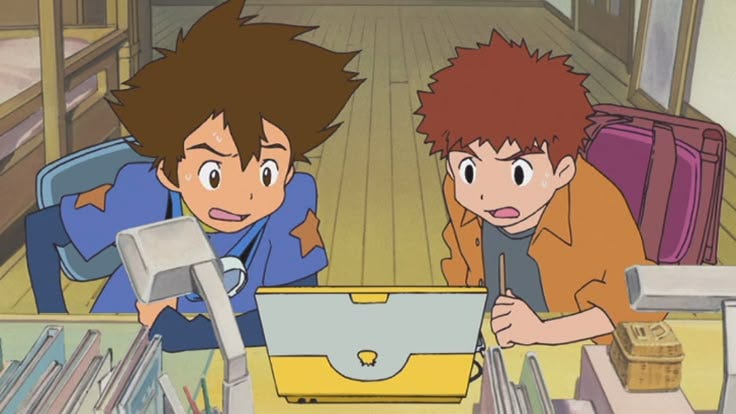 This may contain: two young boys are looking at a laptop in a room with bunk beds and books