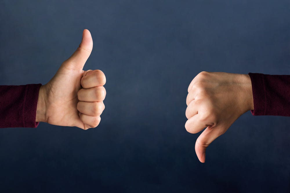 hands showing thumbs up and thumbs down - Wyoming Department of Health