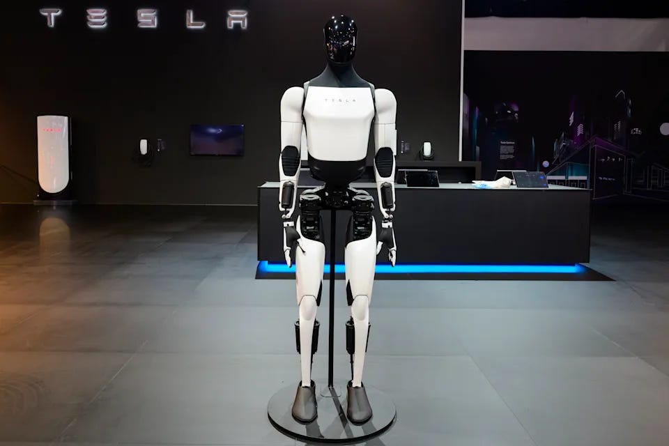 BRUSSELS, BELGIUM - JANUARY 09: Tesla Optimus, also known as Tesla Bot general-purpose robotic humanoid on display at the AutoSalon press preview on January 09, 2026 in Brussels, Belgium. The 102nd Brussels Motor Show has firmly established itself on the international calendar, featuring over 60 car brands and more than 20 motorcycle brands, and visited by over 270,000 people. (Photo by Sjoerd van der Wal/Getty Images)