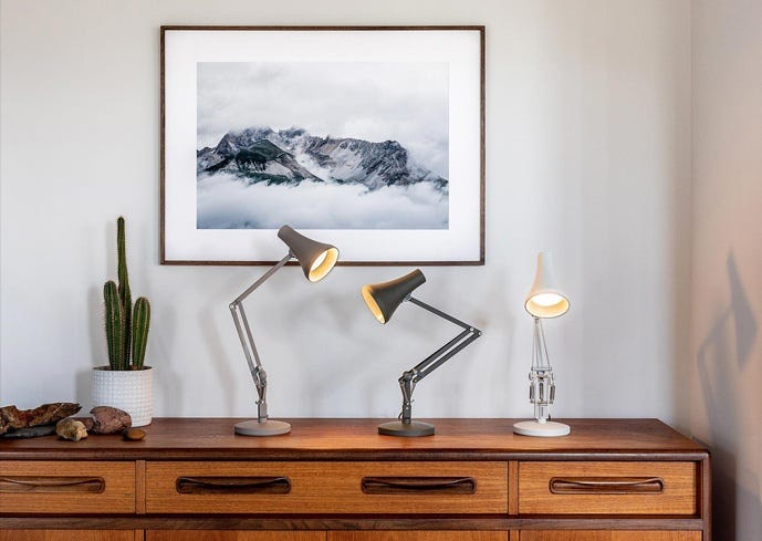 Mid-century sideboard with three anglepoise lamps on top Mid-century sideboard with three anglepoise lamps on top