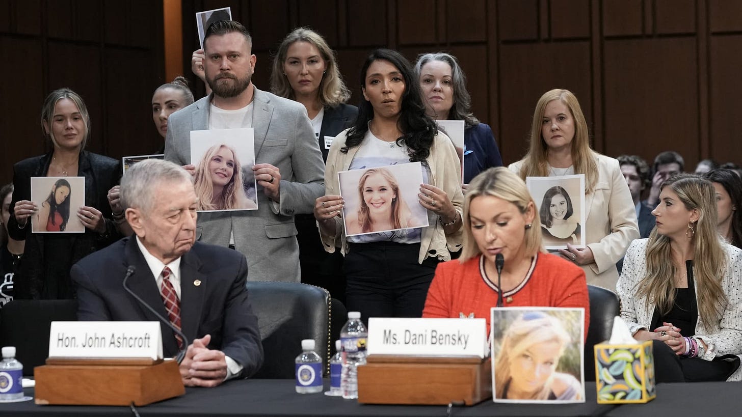 Epstein survivors and family members stand behind former Attorney General John Ashcroft and Jeffrey Epstein survivor Dani Bensky as she speaks during the second day of acting US Attorney General Todd Blanche's Senate Judiciary Committee confirmation hearing on his nomination to be attorney general, on Capitol Hill in Washington, DC, on July 16, 2026. President Donald Trump's pick to be the next US attorney general -- his former personal defense lawyer Todd Blanche. (Photo by Ken Cedeno / AFP via Getty Image Epstein survivors and family members stand behind former Attorney General John Ashcroft and Jeffrey Epstein survivor Dani Bensky as she speaks during the second day of acting US Attorney General Todd Blanche's Senate Judiciary Committee confirmation hearing on his nomination to be attorney general, on Capitol Hill in Washington, DC, on July 16, 2026. President Donald Trump's pick to be the next US attorney general -- his former personal defense lawyer Todd Blanche. (Photo by Ken Cedeno / AFP via Getty Image