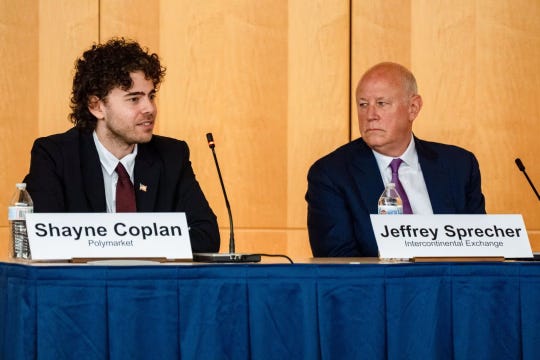 Shayne Coplan of Polymarket and Jeffrey Sprecher of Intercontinental Exchange Inc. at an SEC-CFTC roundtable. Shayne Coplan of Polymarket and Jeffrey Sprecher of Intercontinental Exchange Inc. at an SEC-CFTC roundtable.