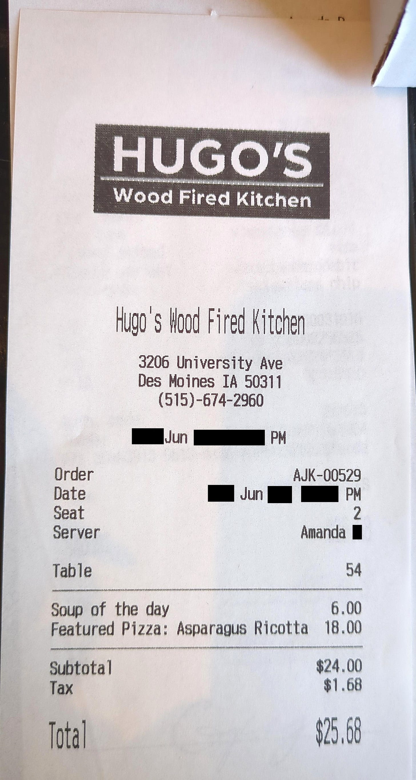 Hugo's Wood Fired Kitchen receipt with a soup of the day for $5 and the featured pizza for $18 for a total of $25.68 with tax. It did not include the tip.