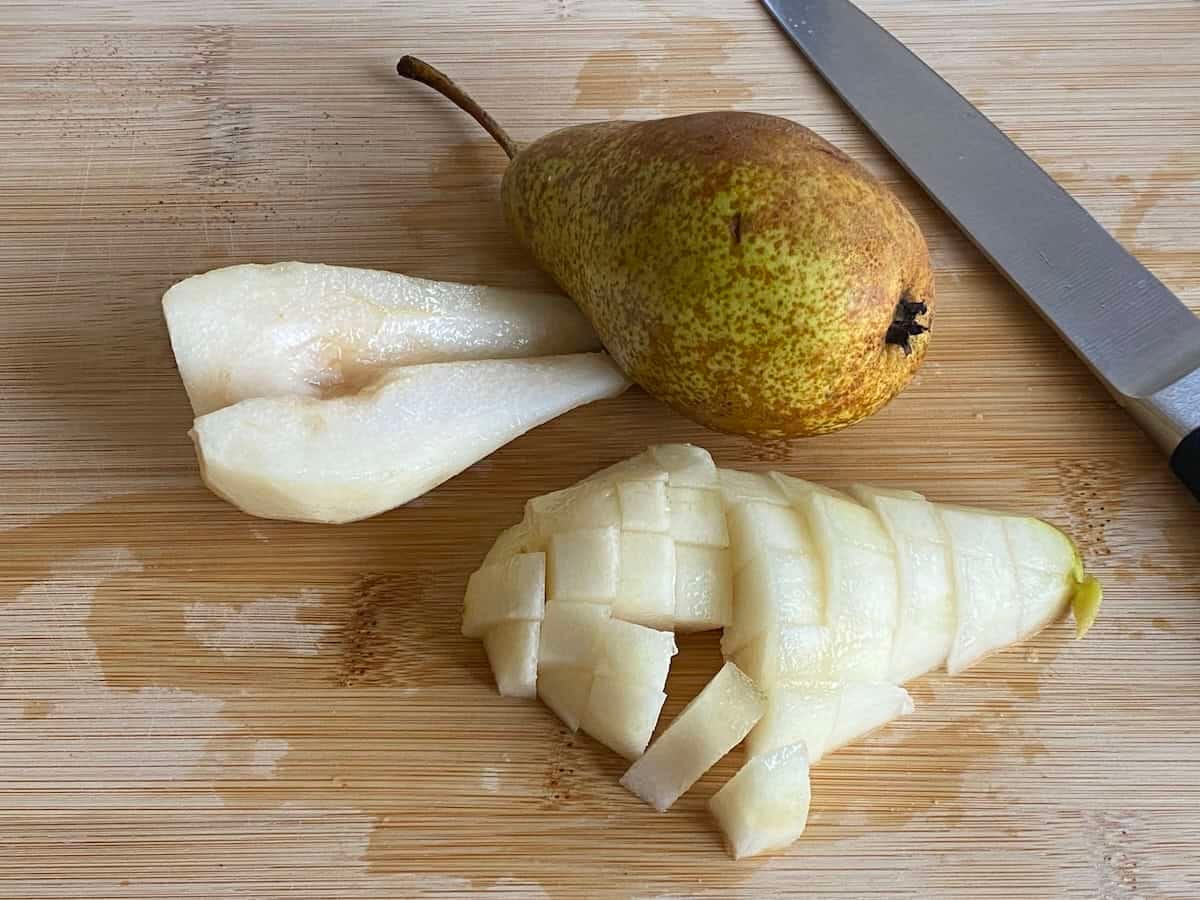 Chopped Pears on a wooden board. Chopped Pears on a wooden board.