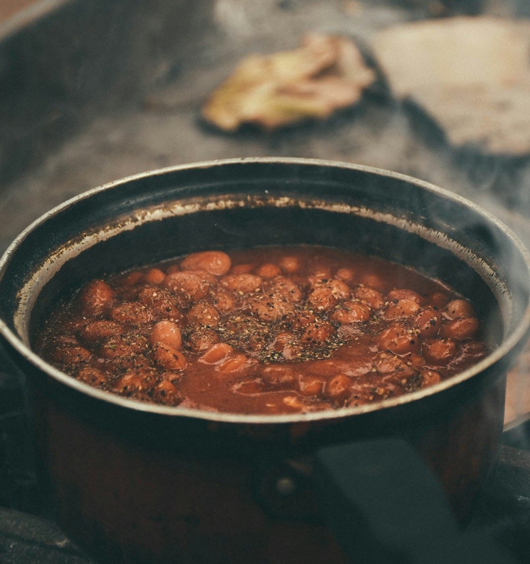 cooked food in black cooking pot
