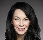 A close-up of a person smiling

AI-generated content may be incorrect.