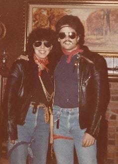 Young couple dressed up in biker outfits for Halloween. Young couple dressed up in biker outfits for Halloween.
