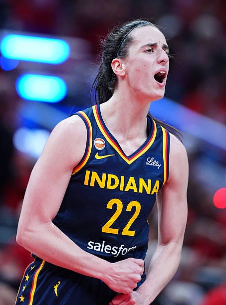 Indiana Fever guard Caitlin Clark reacts after a play against the Las Vegas Aces in game two of Round 1 of the WNBA Playoffs on September 29 at...
