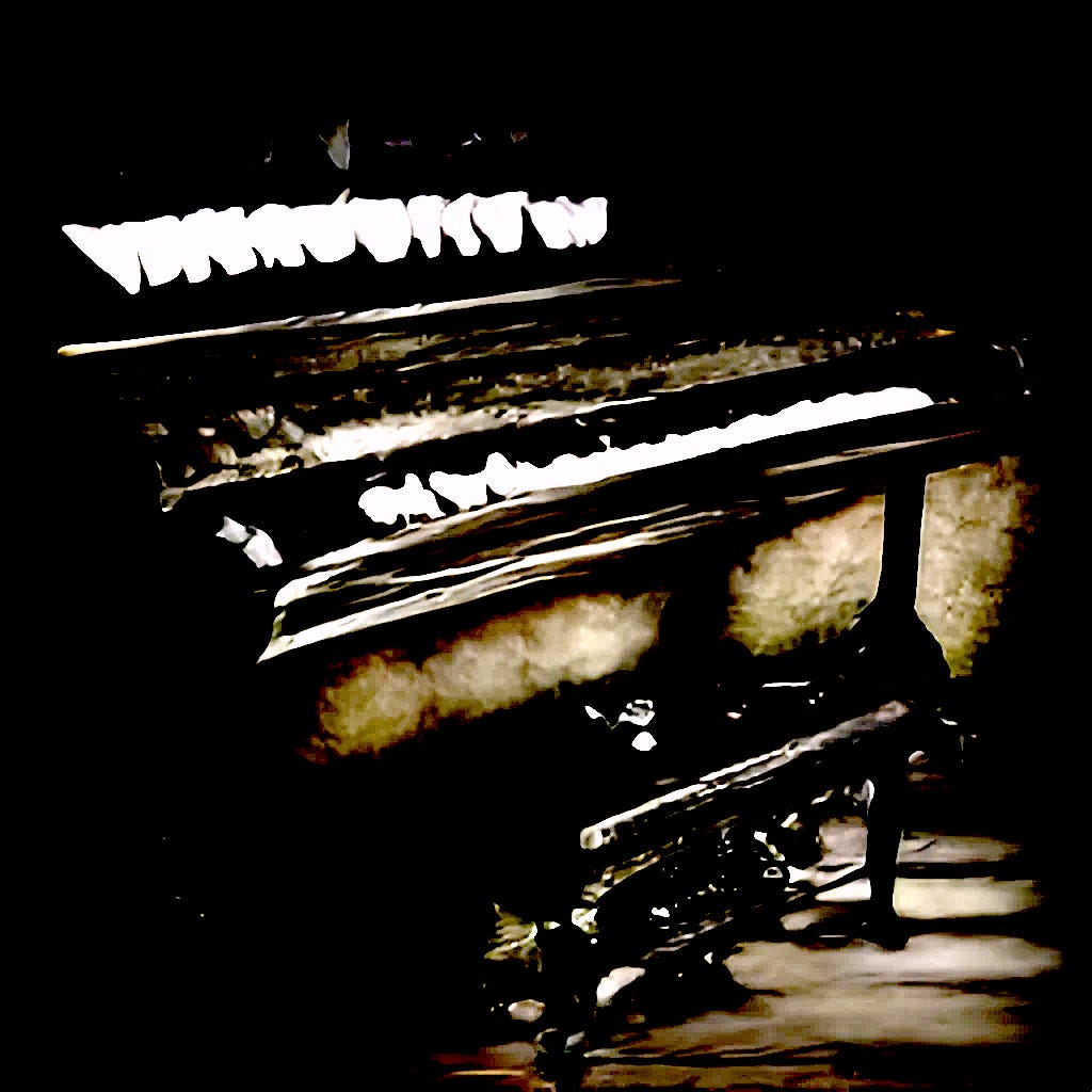a piano with keys made of teeth