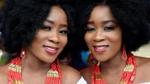 AFP A pair of twins pictured in Igbo-Ora, Nigeria in 2019