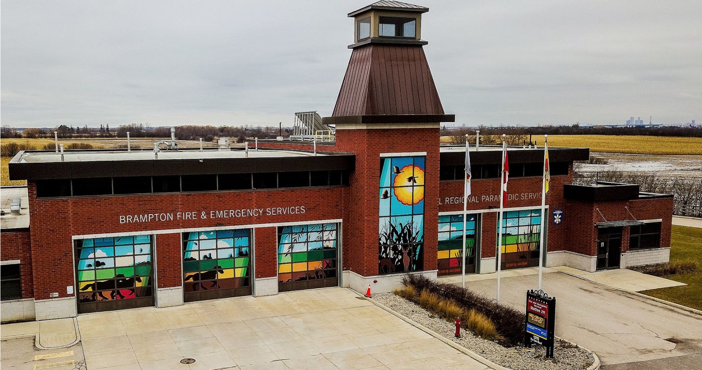A fire station with a tower

AI-generated content may be incorrect.