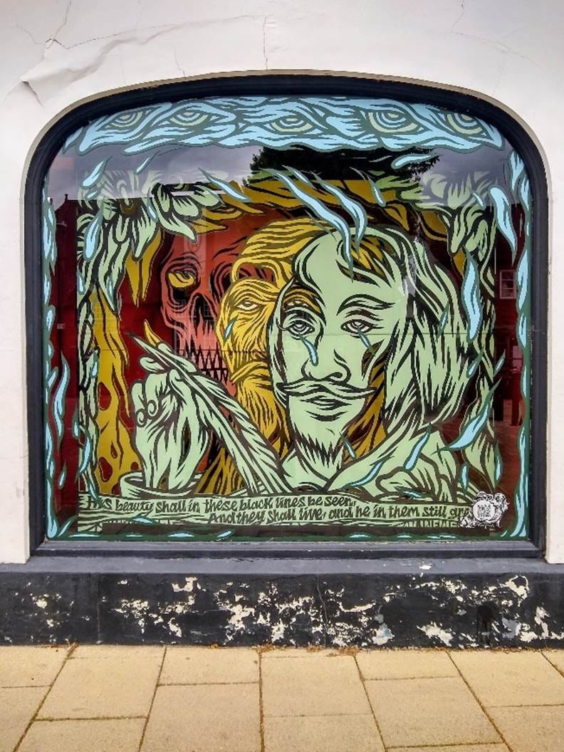 A window with a painting on it
AI-generated content may be incorrect. A window with a painting on it
AI-generated content may be incorrect.