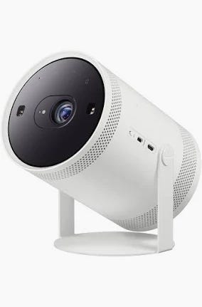 SAMSUNG 30” - 100” The Freestyle 2nd Gen with Gaming Hub Smart Portable Projector, FHD, HDR, Big Screen Home Theater Experience, 360 Sound,