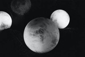 grayscale photo of full moon grayscale photo of full moon