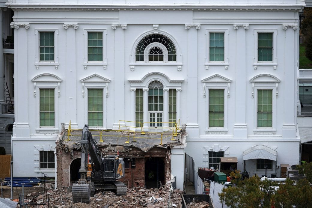 An excavator sits on the rubble after the East Wing of the White House was demolished, on Tuesday.
