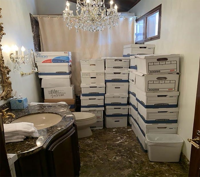 In a handout photo provided by the U.S. Department of Justice, stacks of boxes are seen in a bathroom and shower in the Mar-a-Lago Club’s Lake Room at former President Donald Trump’s estate in Palm Beach, Florida. In a handout photo provided by the U.S. Department of Justice, stacks of boxes are seen in a bathroom and shower in the Mar-a-Lago Club’s Lake Room at former President Donald Trump’s estate in Palm Beach, Florida.