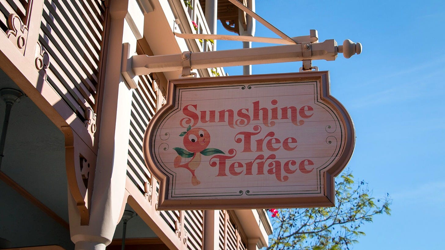 The Sunshine Tree Terrace sign with the Orange Bird at Magic Kingdom. Image: HarshLight via Wikimedia Commons The Sunshine Tree Terrace sign with the Orange Bird at Magic Kingdom. Image: HarshLight via Wikimedia Commons