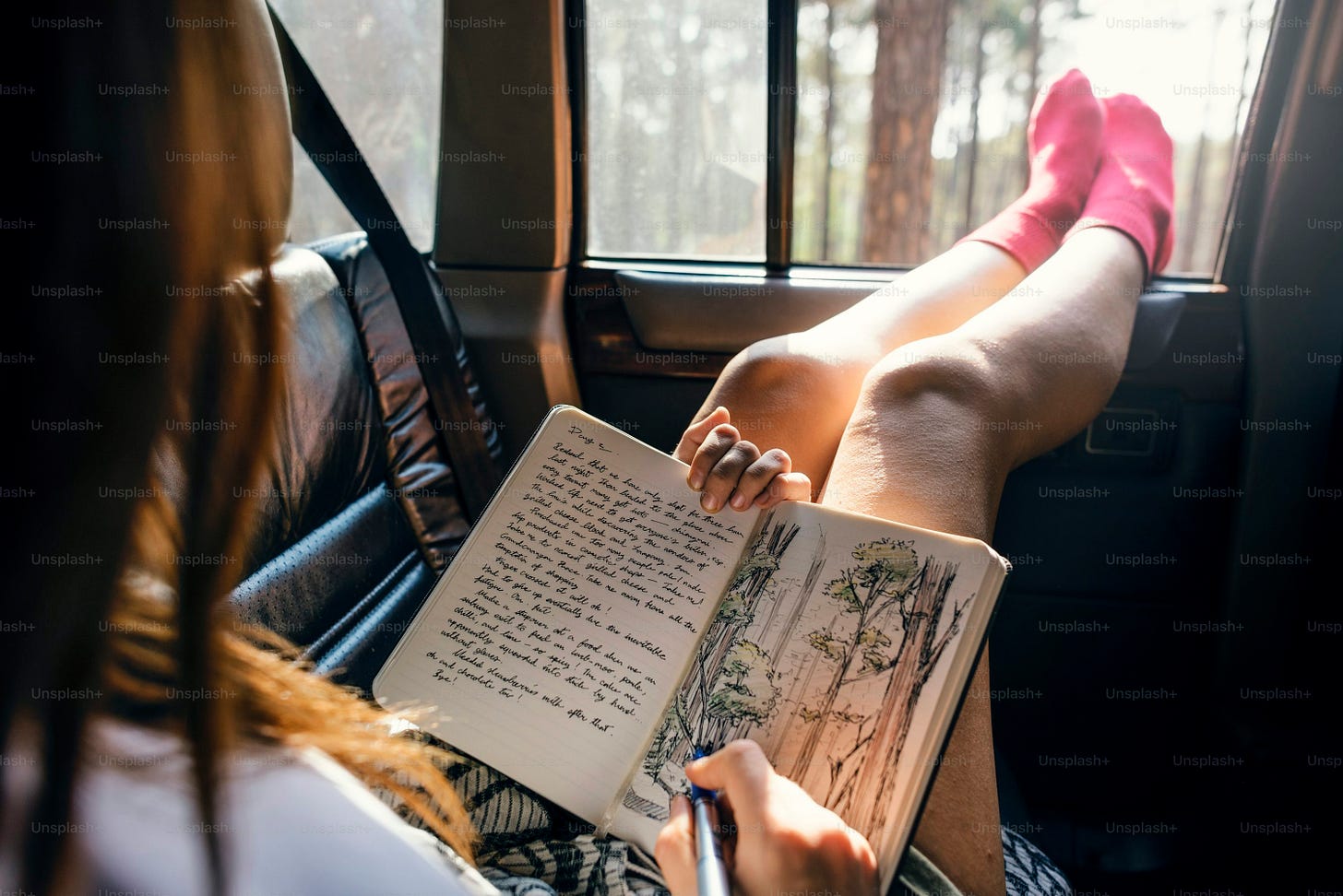 Girl Drawing Pad Road Trip Concept