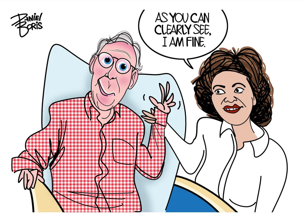 Mitch McConnell seen seated in hospital chair. His wife holds his arm. Wife: “As you can see, I am fine.”