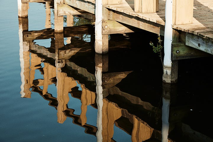 Yellow wood and blue-green water