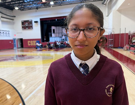 A young actress tries to stop smiling to portray the gloomy Wednesday Addams in the musical "The Addams Family."