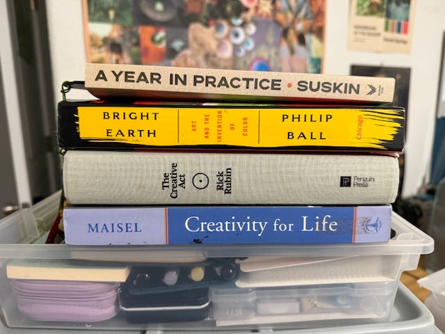 Stack of books about art and creativity arranged on a surface