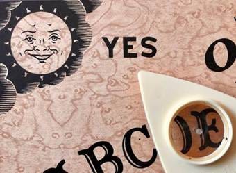 Ouija board Close view of ouija board with planchette pointing at the word yes ouija board stock pictures, royalty-free photos & images Ouija board Close view of ouija board with planchette pointing at the word yes ouija board stock pictures, royalty-free photos & images