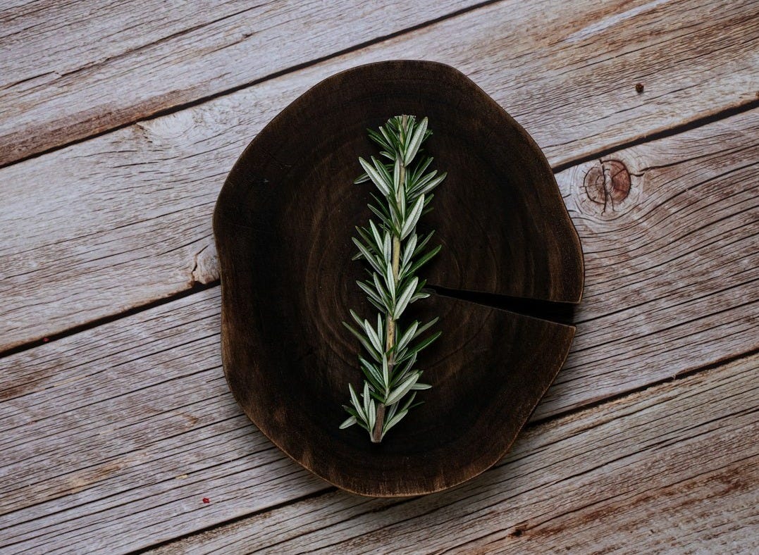 a piece of wood sitting on top of a wooden table