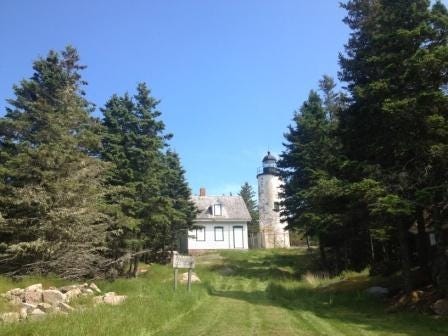 A house with a lighthouse in the background

AI-generated content may be incorrect.