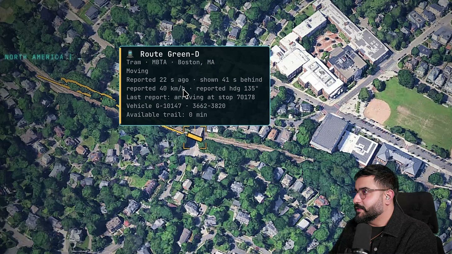 A 3D view of Boston with a selected MBTA Green-D tram, its route information card, and a yellow route trail. A 3D view of Boston with a selected MBTA Green-D tram, its route information card, and a yellow route trail.