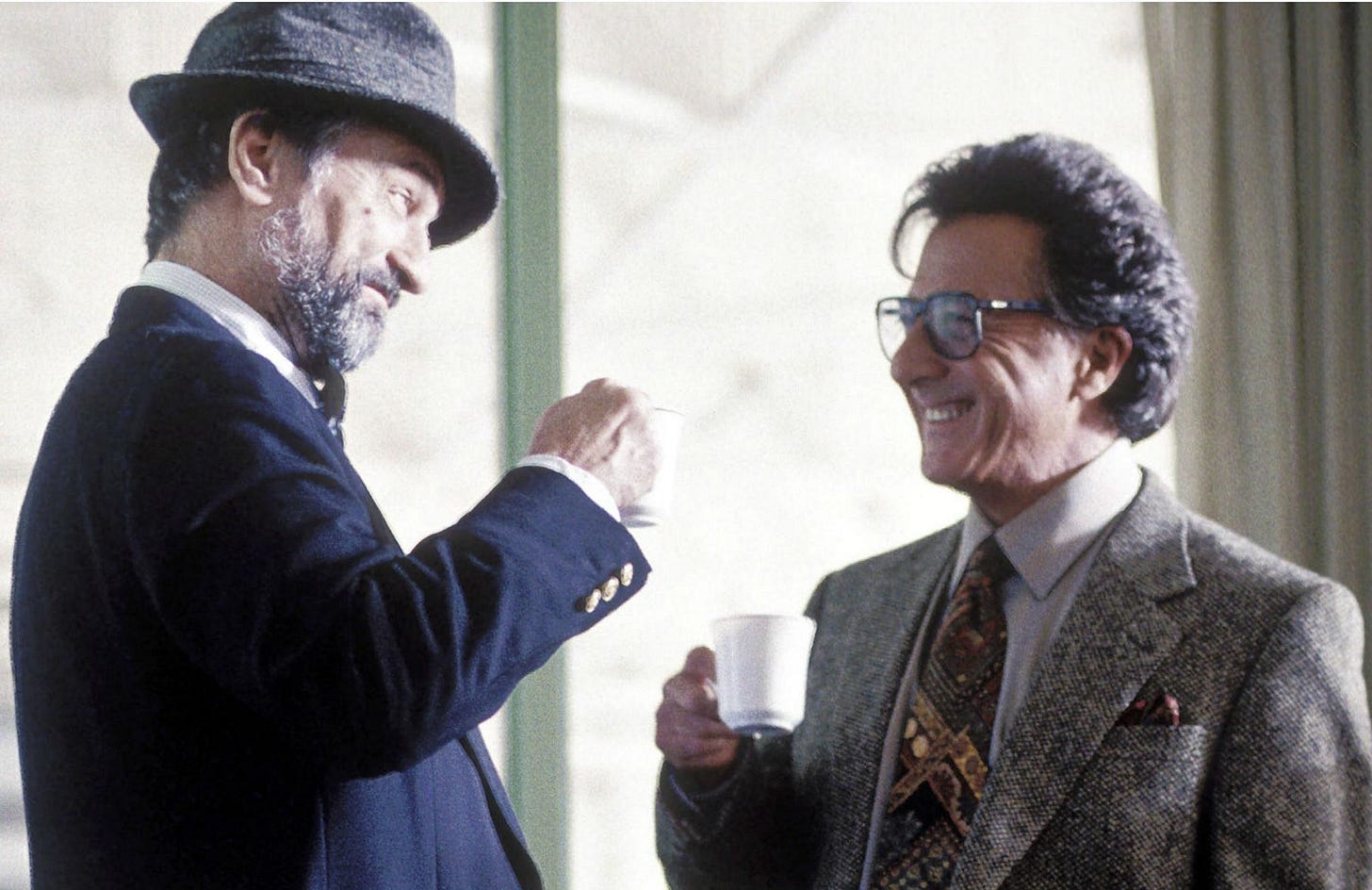 Robert De Niro as spin doctor Conrad Brean and Dustin Hoffman as Hollywood producer Stanley Motss in 'Wag the Dog'