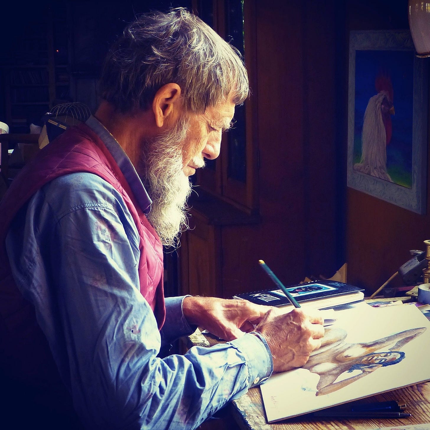 old man drawing with a pencil old man drawing with a pencil