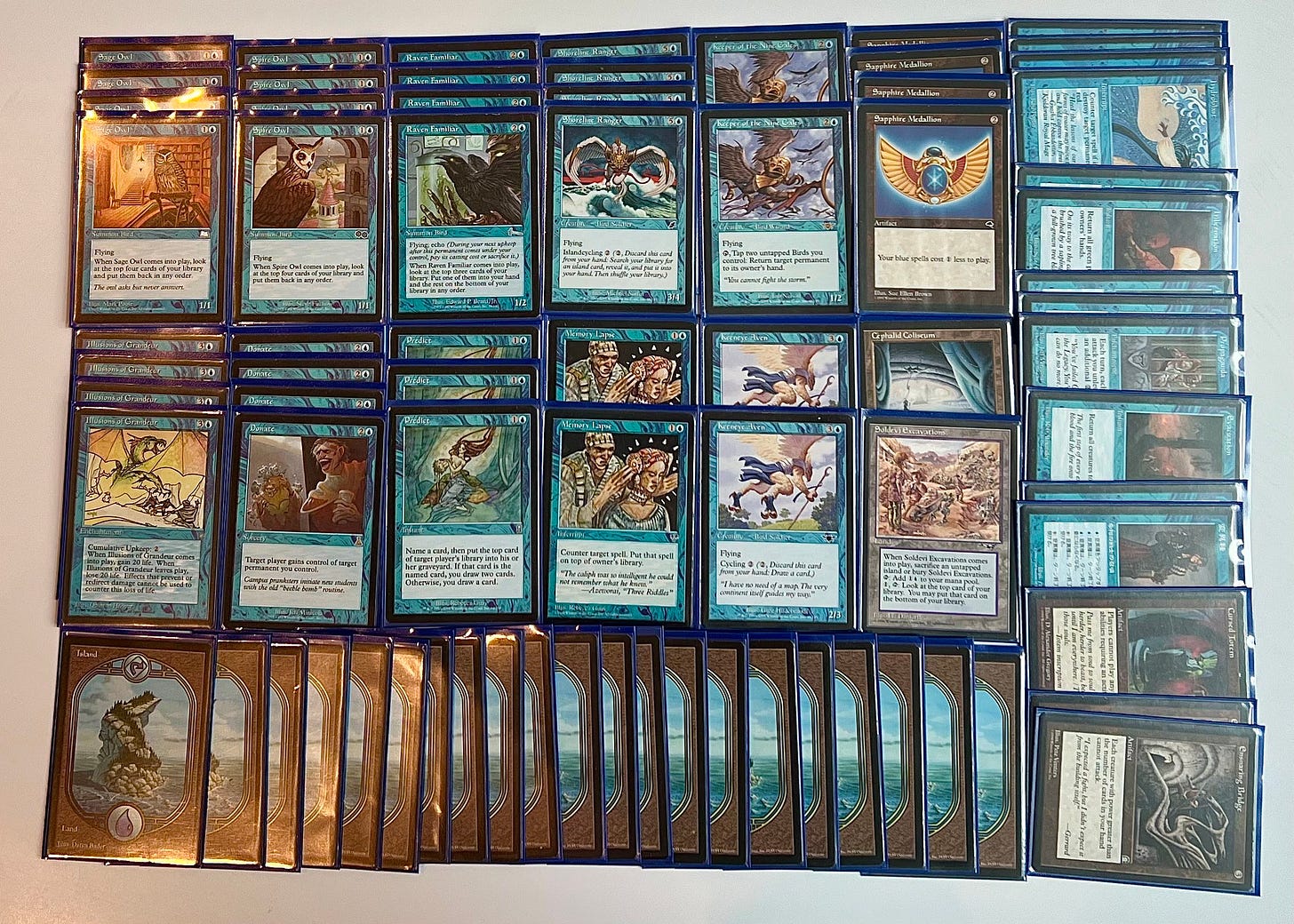 1 Cephalid Coliseum (ODY) 317
4 Donate (UDS) 31
4 Illusions of Grandeur (ICE) 79
21 Island (USG) 335
2 Keeneye Aven (LGN) 41
2 Keeper of the Nine Gales (LGN) 42
2 Memory Lapse (MIR) 74
3 Predict (ODY) 94
4 Raven Familiar (ULG) 39
4 Sage Owl (WTH) 52
4 Sapphire Medallion (TMP) 306
4 Shoreline Ranger (SCG) 51
1 Soldevi Excavations (ALL) 143
4 Spire Owl (USG) 98

1 Cursed Totem (MIR) 299
2 Ensnaring Bridge (STH) 133
1 Evacuation (STH) 30
2 Hibernation (USG) 79
4 Hydroblast (ICE) 72
2 Morphling (USG) 85
3 Propaganda (TMP) 80