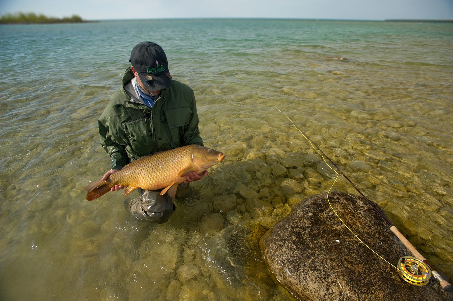 Guide Kevin Morlock with a common carp in beautiful shape.