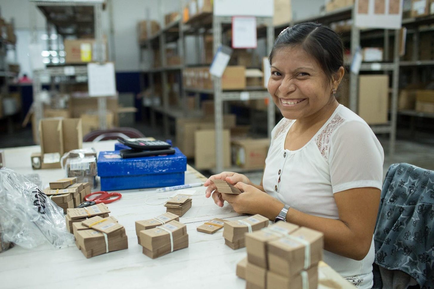  Maria Adela Batun Batun checks the Fair Trade Certified tags