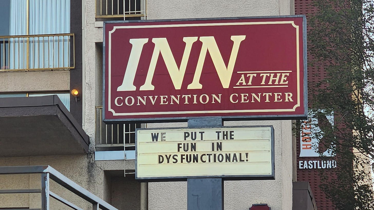 Hotel marquee that says "we put the fun in dysfunctional" Hotel marquee that says "we put the fun in dysfunctional"