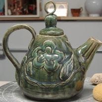 handbuilt ceramic teapot, heavily carved