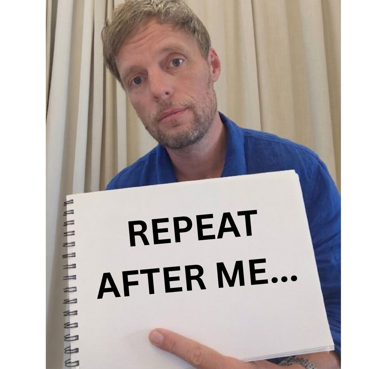 Same man and notebook. Printed text: "REPEAT AFTER ME..."