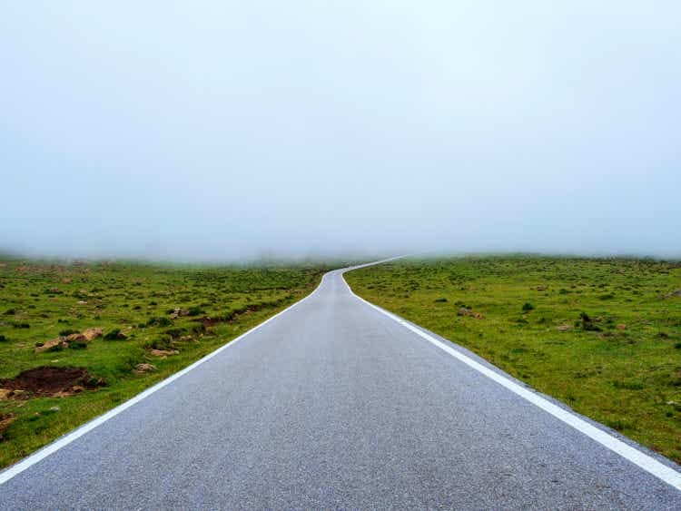 Mountain road with fog Mountain road with fog