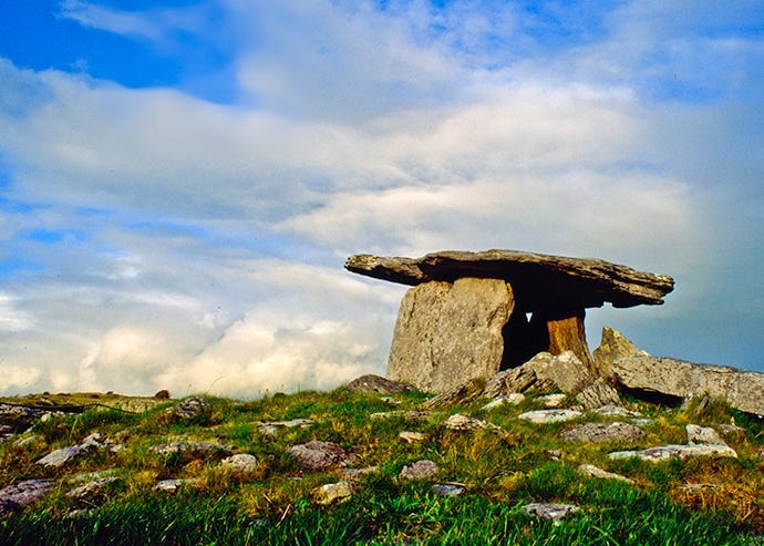 Photograph of a megalithic site in Ireland known as the Poulnabrone Dolmen