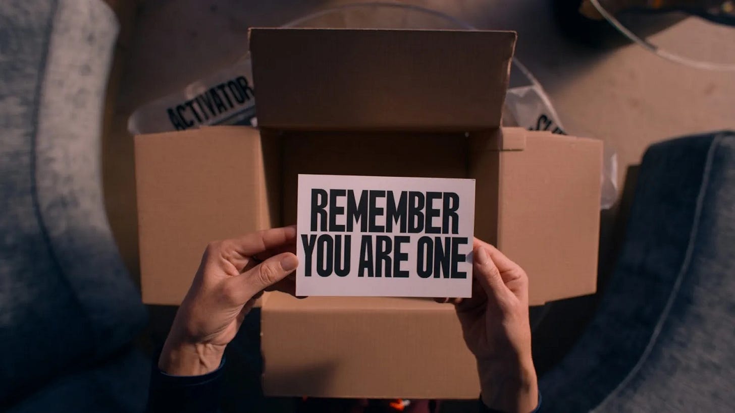 Elisabeth Sparkle opens a box in the 2024 film The Substance and finds a card that reads "REMEMBER YOU ARE ONE"