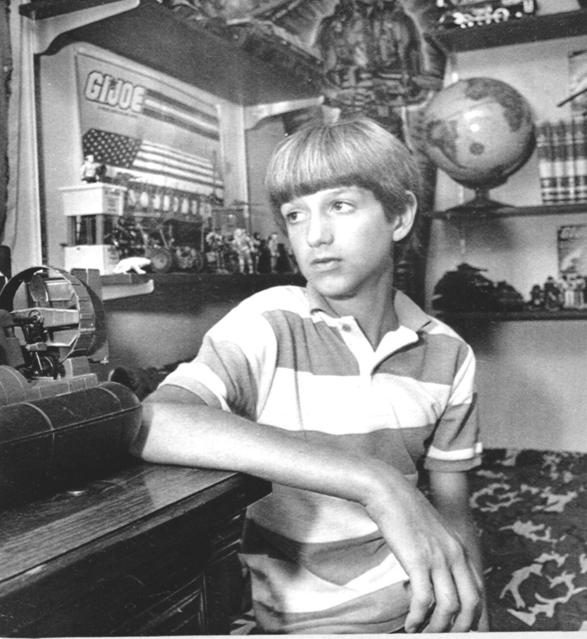 Thirteen-year-old Ryan White sits in his room at home on July 31, 1985, after being barred from middle school following his AIDS diagnosis, contracted during treatment for hemophilia. His story sparked national debate.