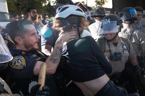 Demonstrators confront police during a protest outside an immigrant processing and detention center on October 03, 2025 in Broadview, Illinois Demonstrators confront police during a protest outside an immigrant processing and detention center on October 03, 2025 in Broadview, Illinois