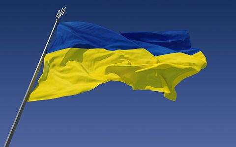 A flag flying in the air

Description automatically generated with low confidence